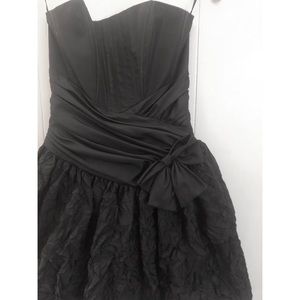 80s inspired black cocktail dress